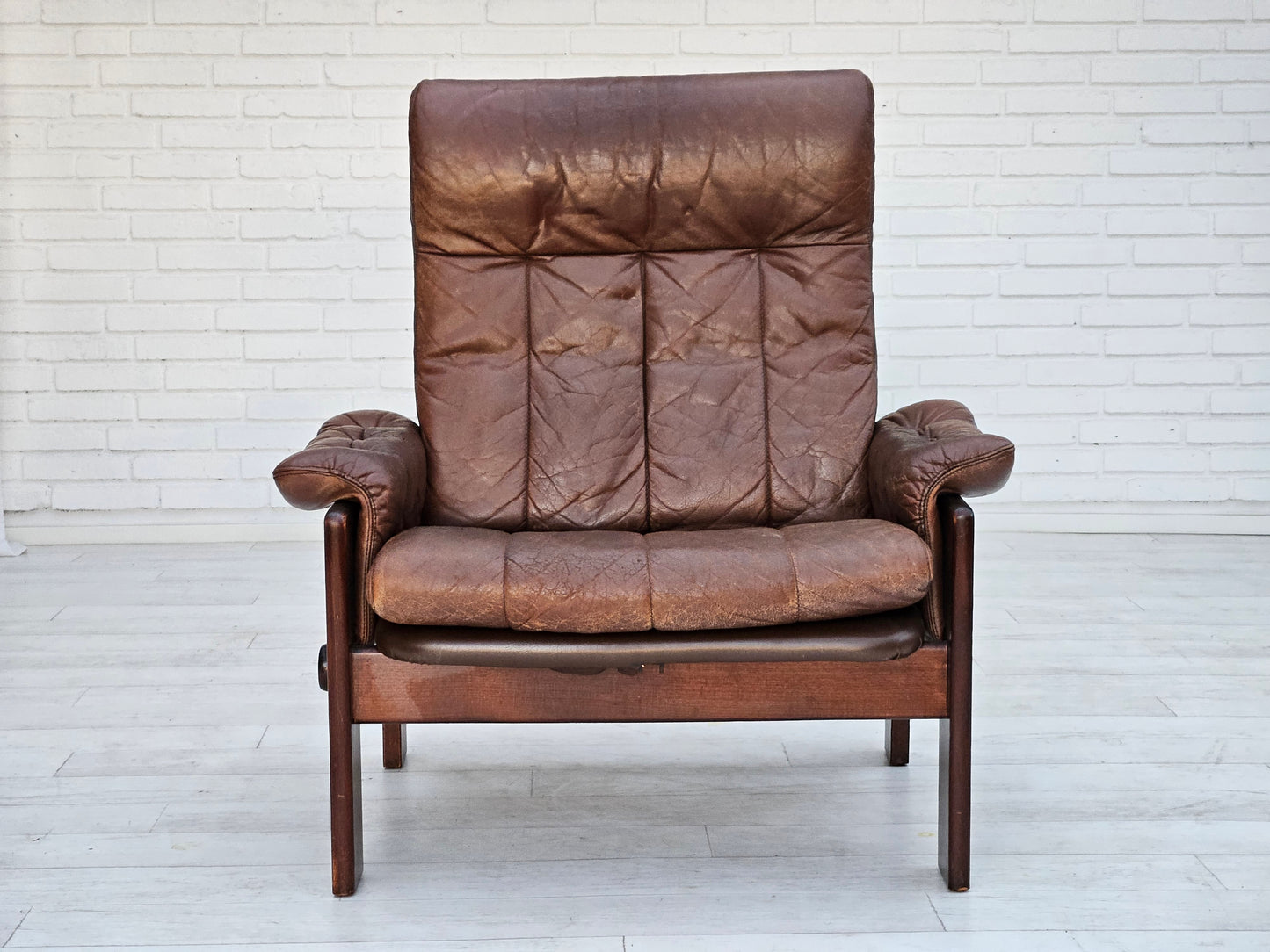 1970s, Danish adjustable lounge chair with footstool, brown leather, by Skippers Møbler.