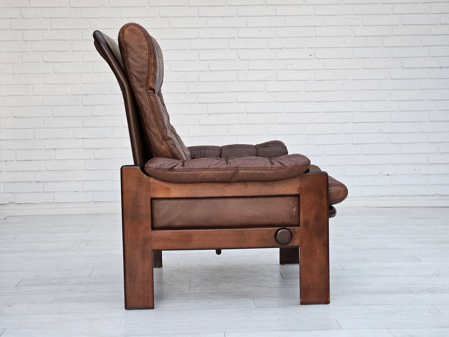 1970s, Danish adjustable lounge chair with footstool, brown leather, by Skippers Møbler.