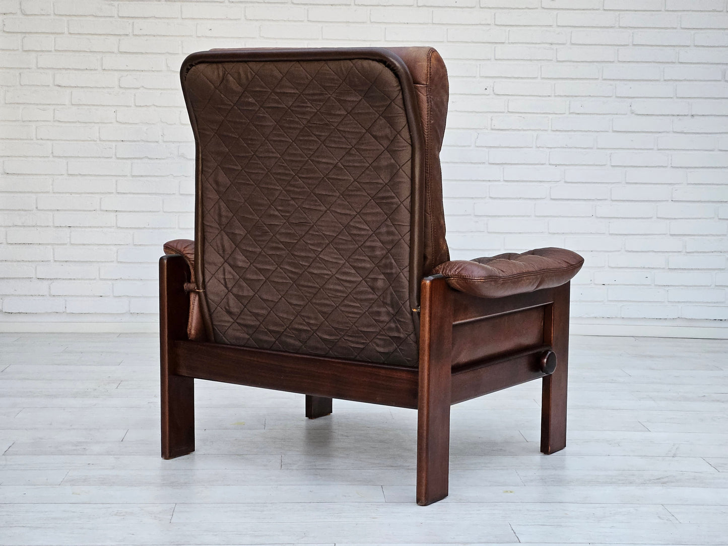 1970s, Danish adjustable lounge chair with footstool, brown leather, by Skippers Møbler.