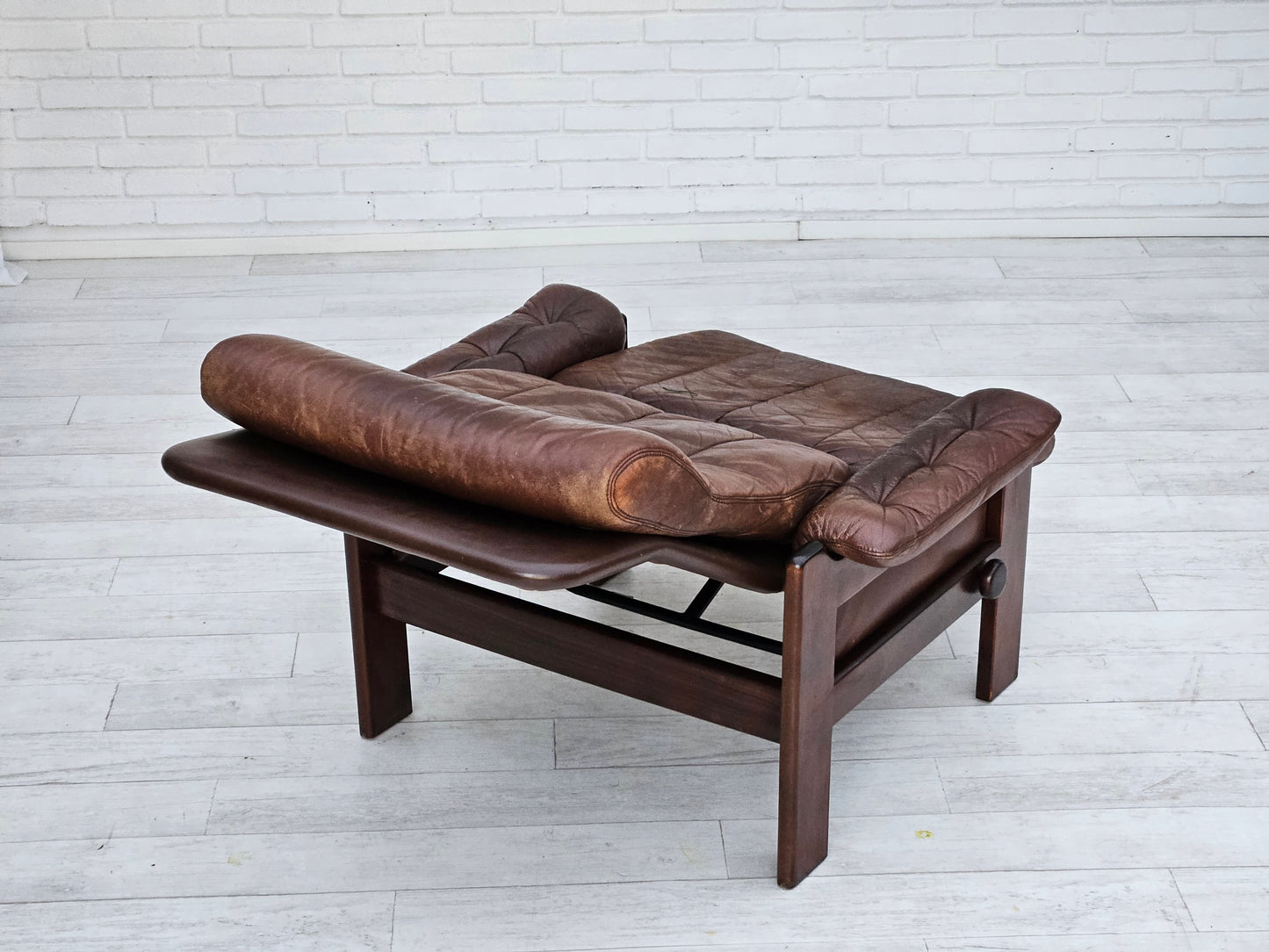 1970s, Danish adjustable lounge chair with footstool, brown leather, by Skippers Møbler.