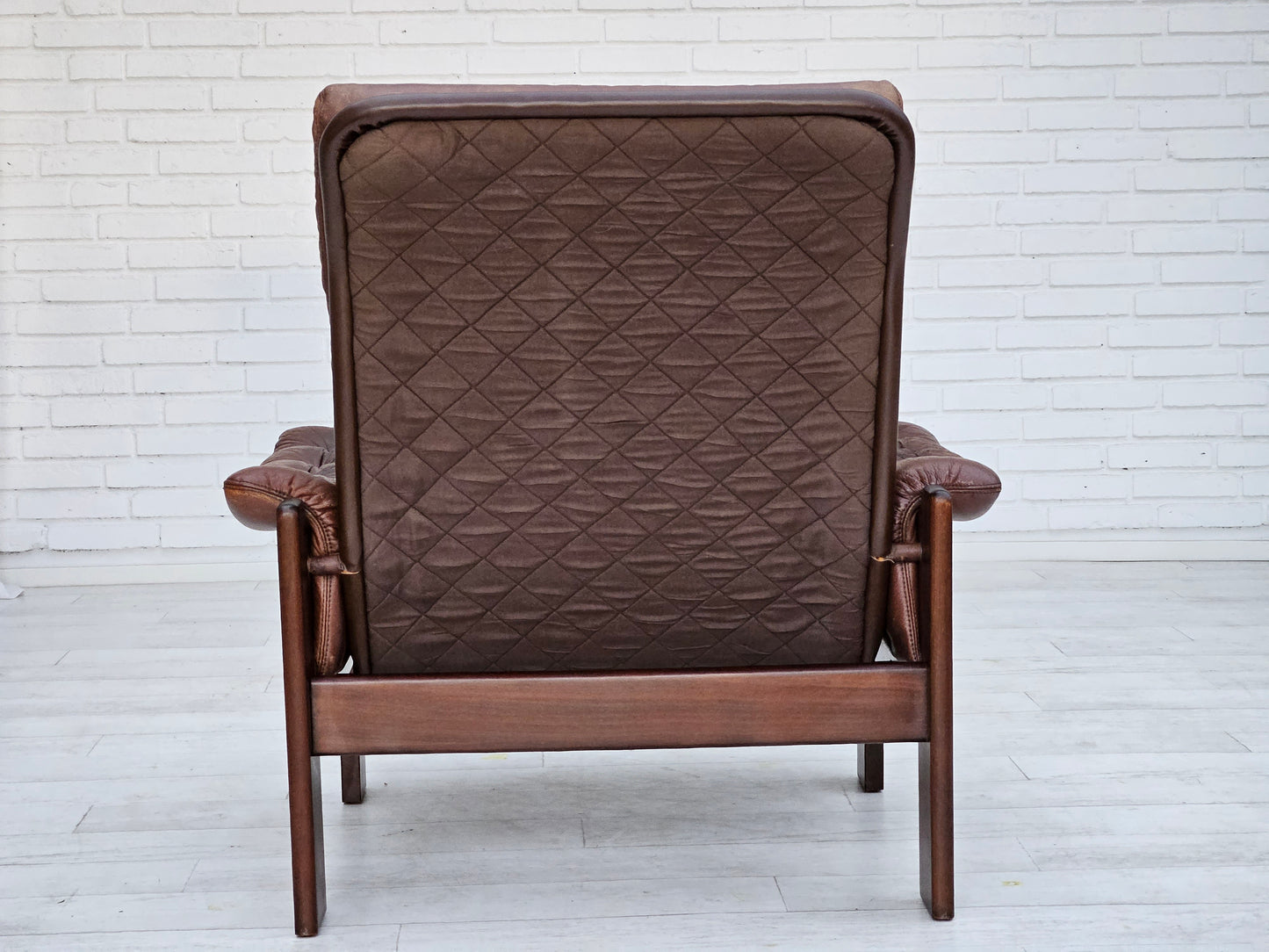 1970s, Danish adjustable lounge chair with footstool, brown leather, by Skippers Møbler.