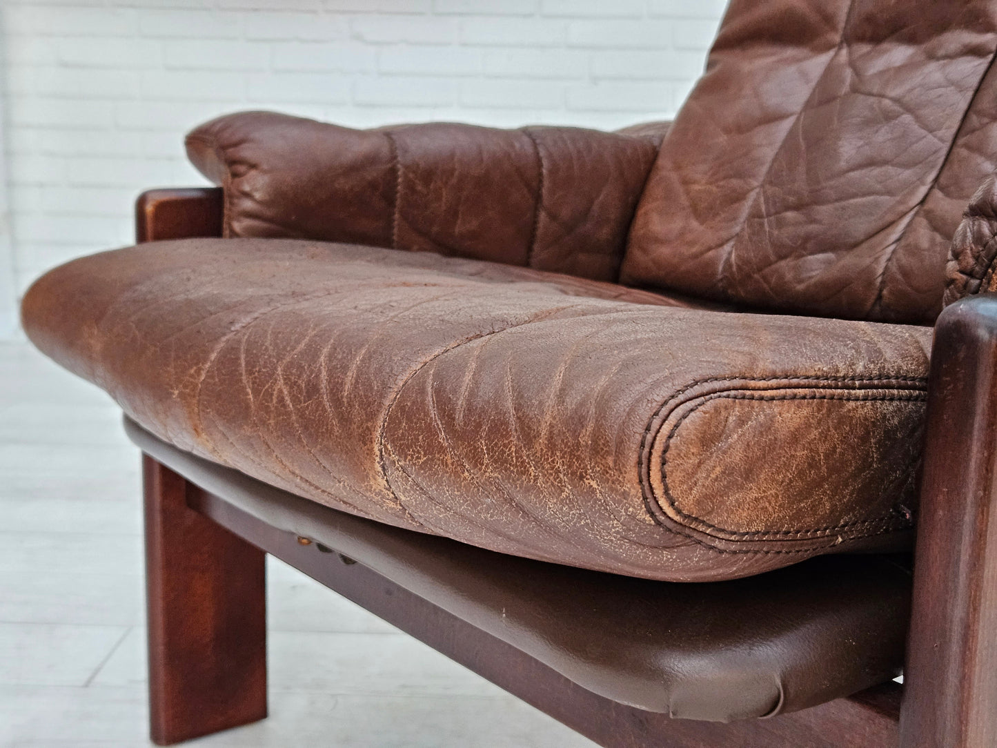 1970s, Danish adjustable lounge chair with footstool, brown leather, by Skippers Møbler.