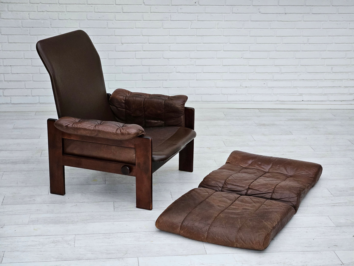 1970s, Danish adjustable lounge chair with footstool, brown leather, by Skippers Møbler.