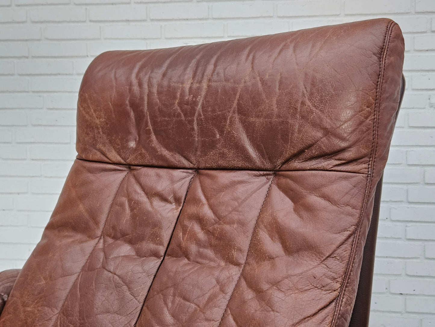 1970s, Danish adjustable lounge chair with footstool, brown leather, by Skippers Møbler.