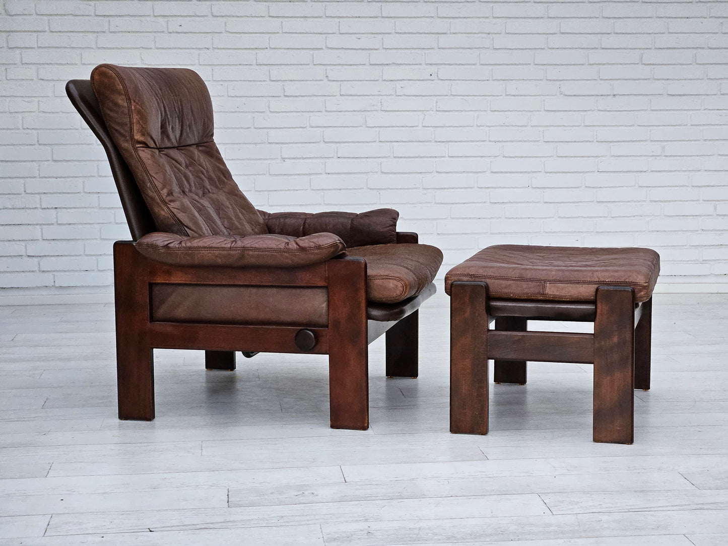 1970s, Danish adjustable lounge chair with footstool, brown leather, by Skippers Møbler.