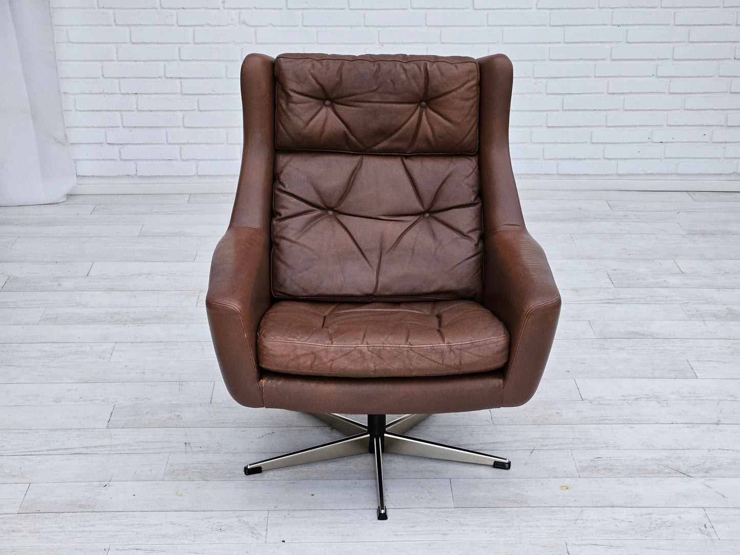 1970s, Danish swivel chair with footstool, original good condition, leather.