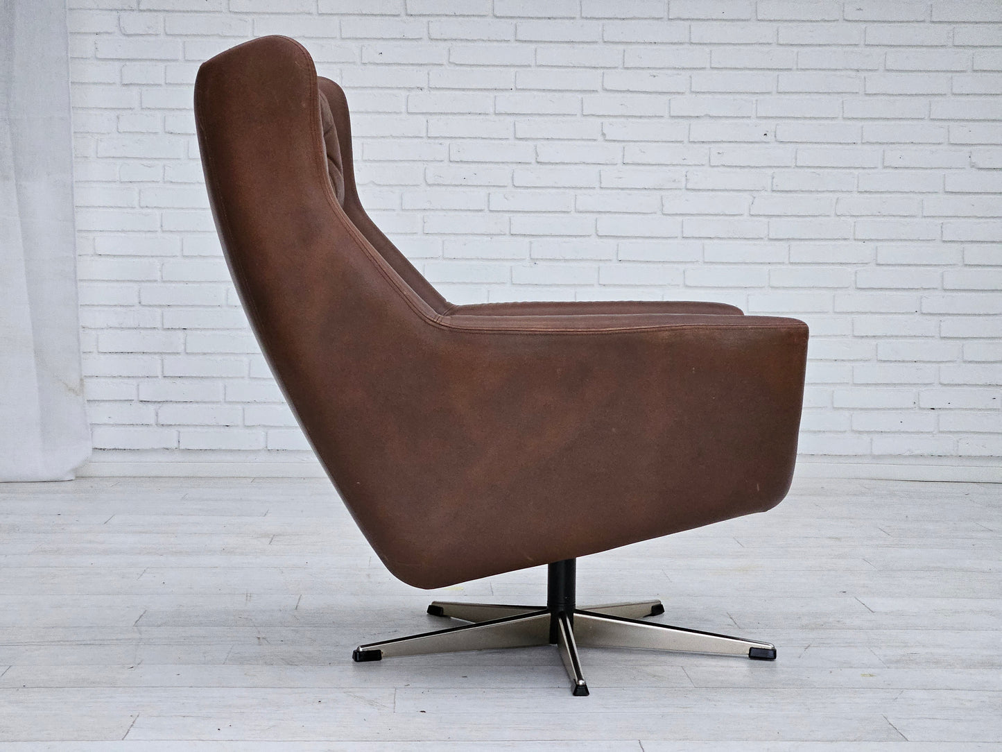 1970s, Danish swivel chair with footstool, original good condition, leather.