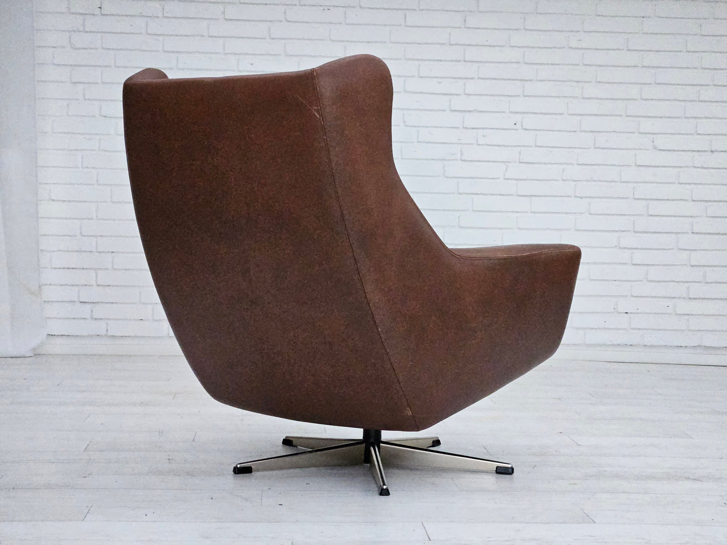 1970s, Danish swivel chair with footstool, original good condition, leather.