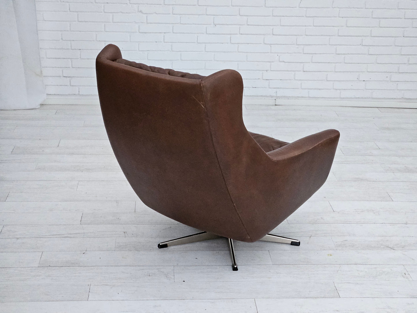 1970s, Danish swivel chair with footstool, original good condition, leather.