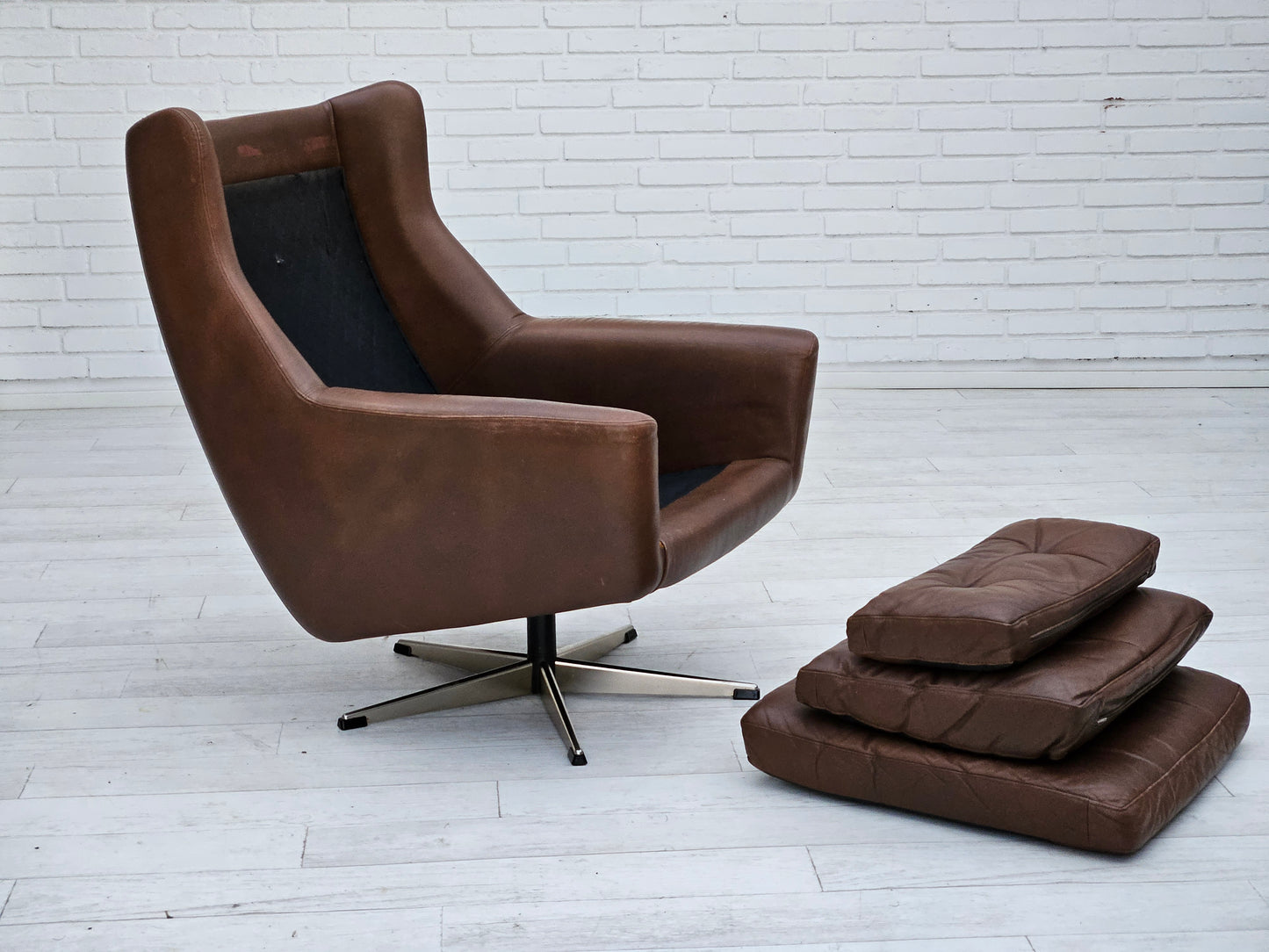 1970s, Danish swivel chair with footstool, original good condition, leather.