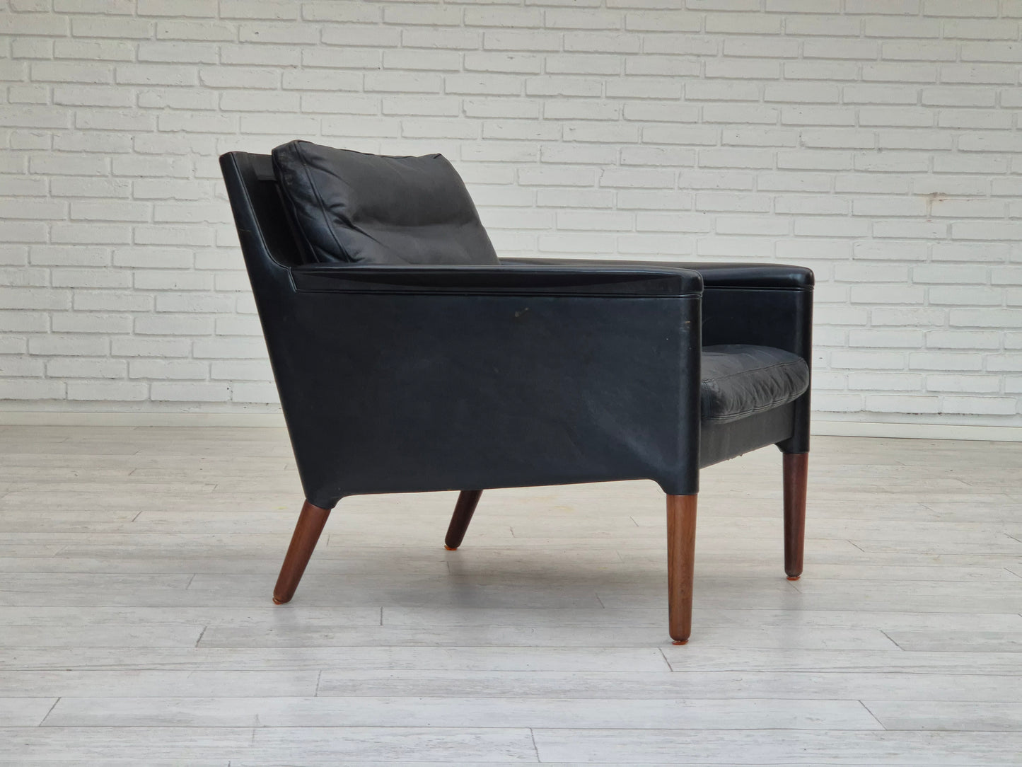 1960s, Danish design by Kurt Østervig, lounge chair model 55, leather, rosewood legs, original condition.