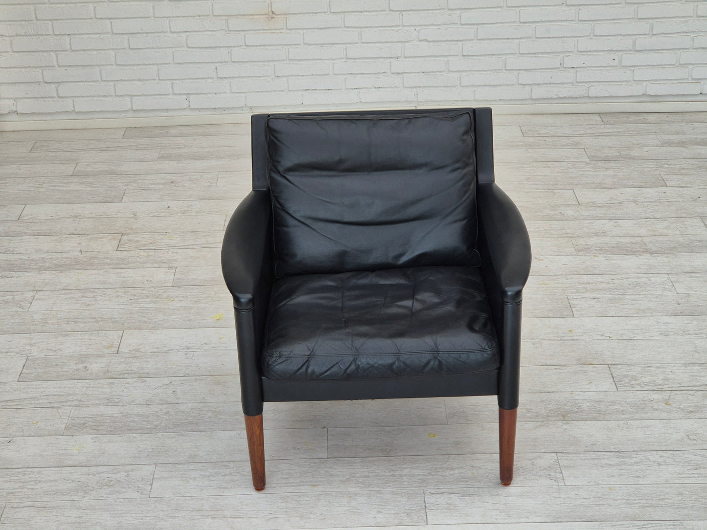 1960s, Danish design by Kurt Østervig, lounge chair model 55, leather, rosewood legs, original condition.