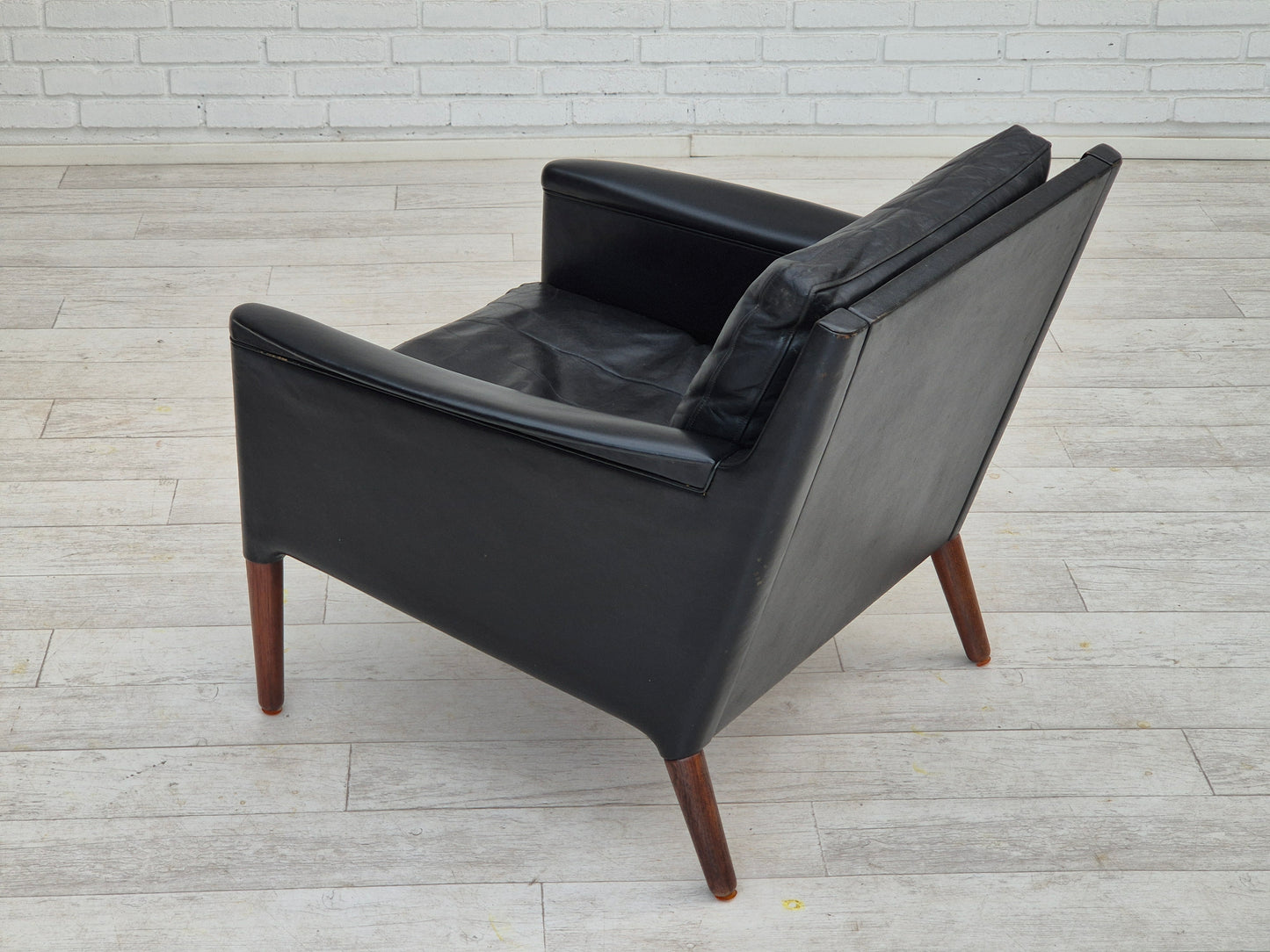 1960s, Danish design by Kurt Østervig, lounge chair model 55, leather, rosewood legs, original condition.