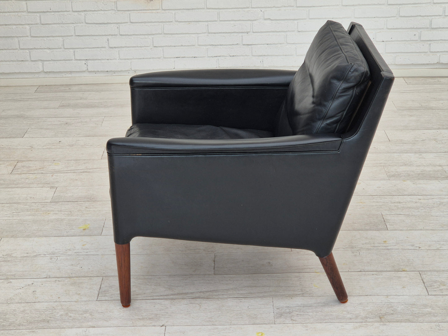 1960s, Danish design by Kurt Østervig, lounge chair model 55, leather, rosewood legs, original condition.