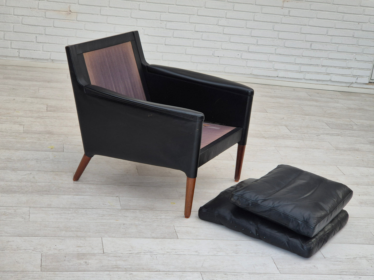 1960s, Danish design by Kurt Østervig, lounge chair model 55, leather, rosewood legs, original condition.