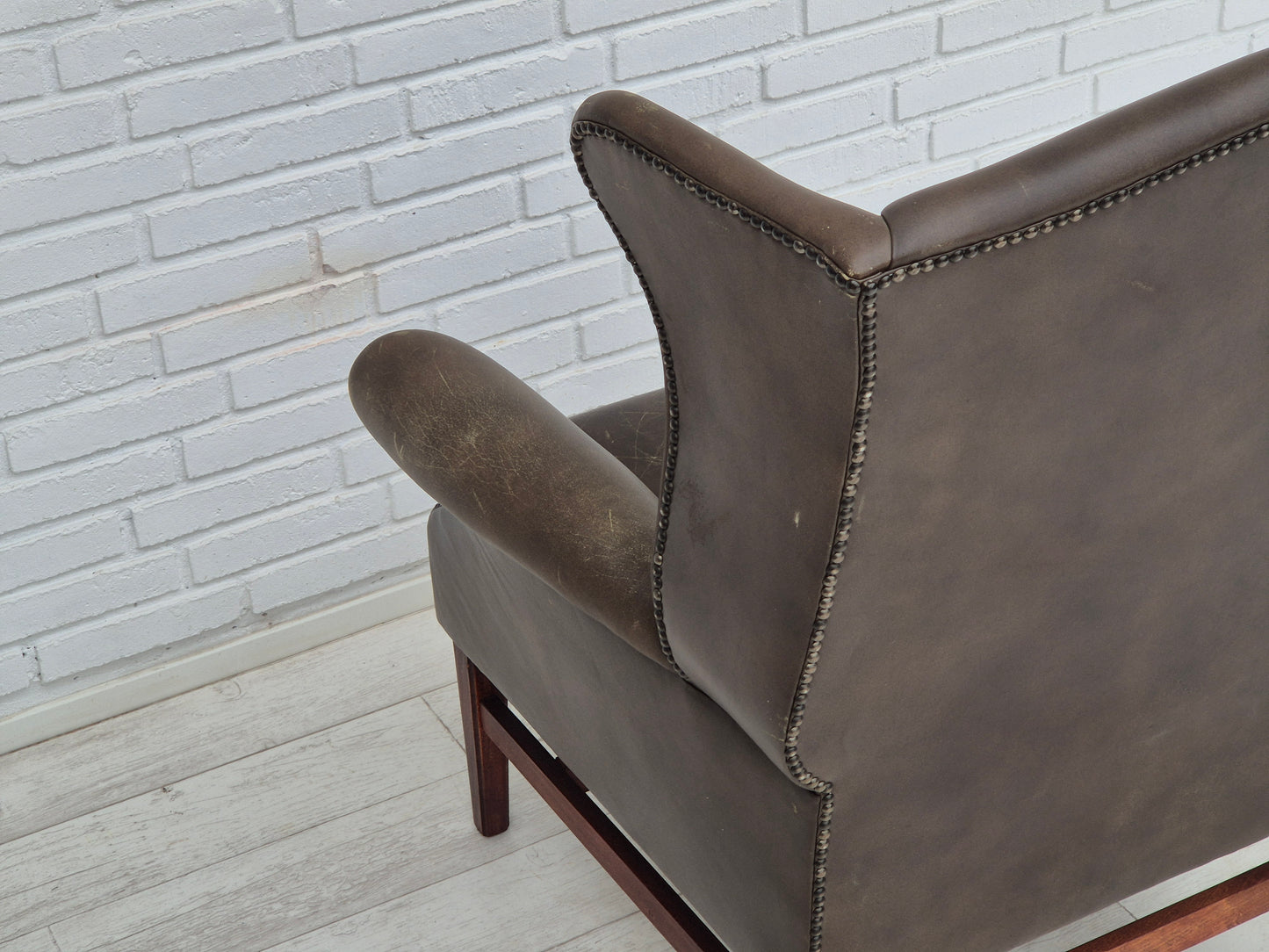 1970s, Vintage wingback armchair, original condition, leather, beech wood.