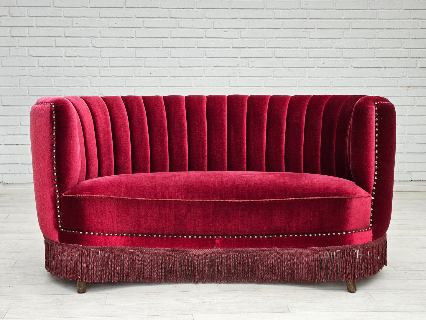 1970s, Danish 2-seater "Banana" sofa, original cherry-red velour.