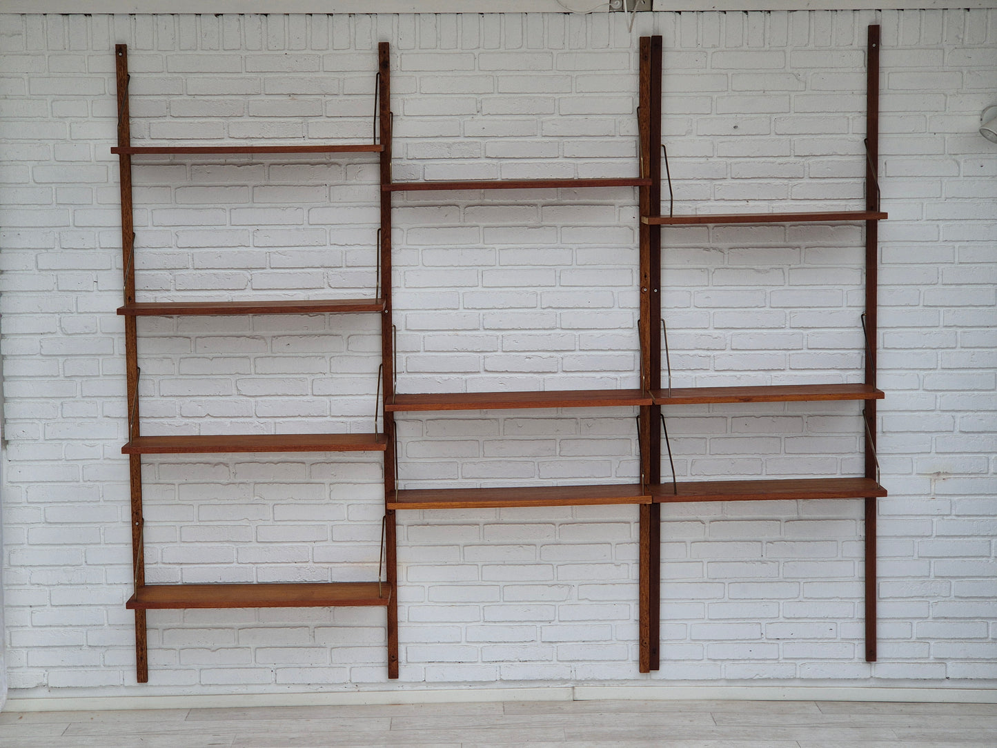 1970s, Danish shelving system "Royal System" by Paul Cadovius, teak wood.