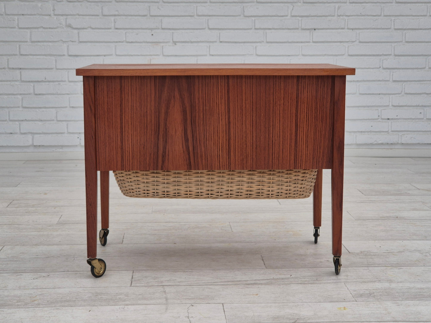 1970s, Danish side chest of drawers, teak wood, rattan, brass wheels, original condition.