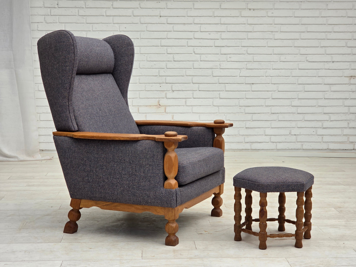 1970s, highback Danish armchair with footstool, furniture wool fabric, solid oak wood.