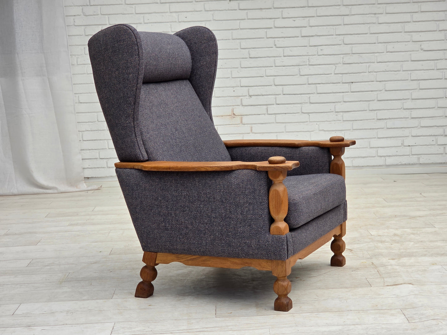 1970s, highback Danish armchair with footstool, furniture wool fabric, solid oak wood.