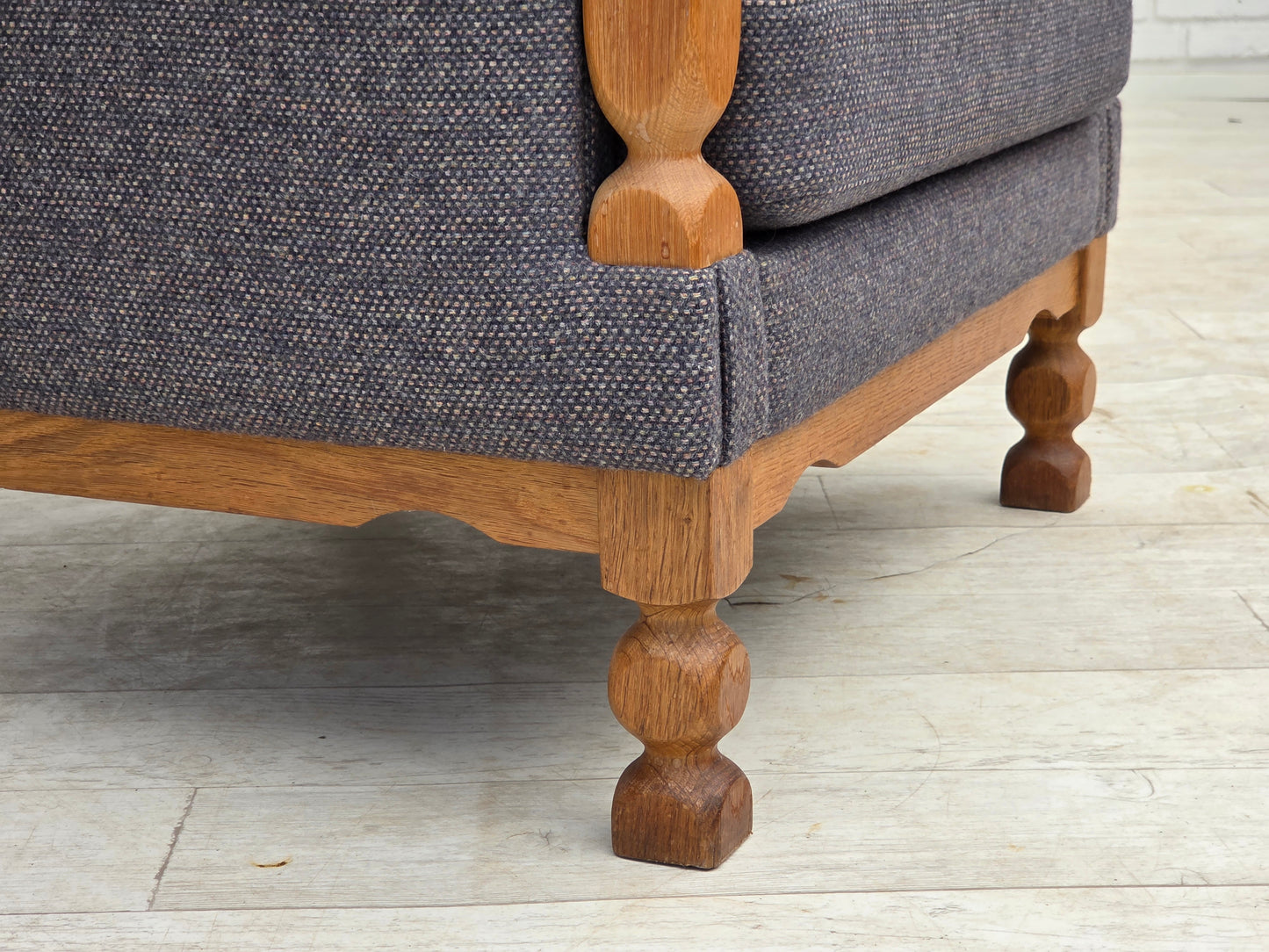 1970s, highback Danish armchair with footstool, furniture wool fabric, solid oak wood.