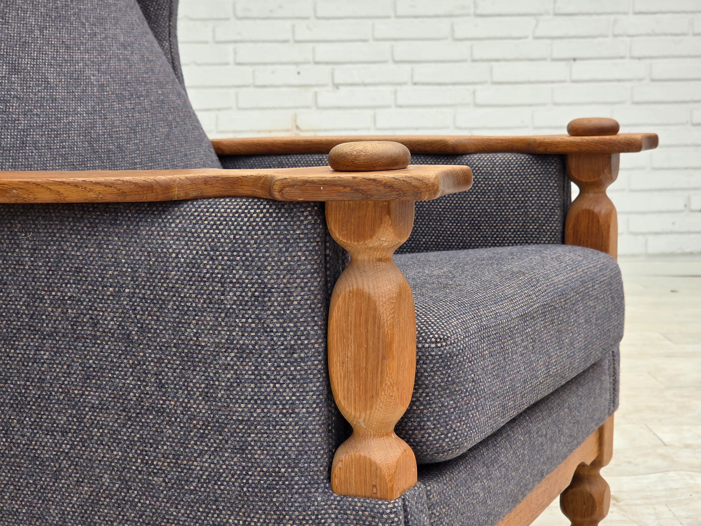 1970s, highback Danish armchair with footstool, furniture wool fabric, solid oak wood.