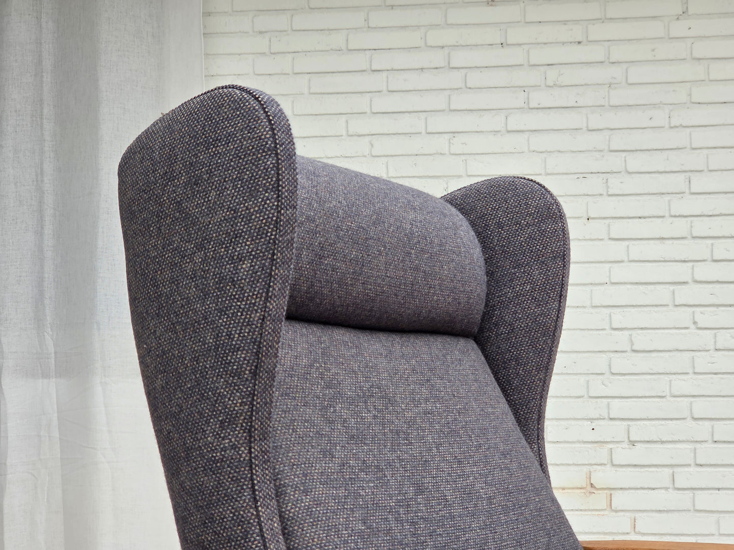 1970s, highback Danish armchair with footstool, furniture wool fabric, solid oak wood.
