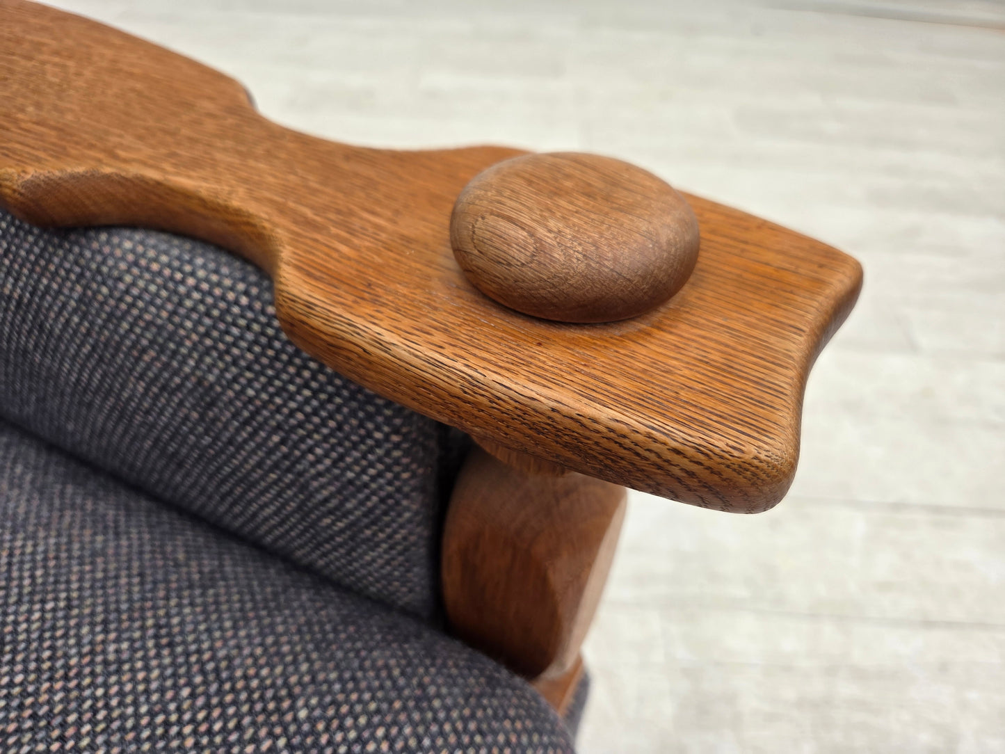 1970s, highback Danish armchair with footstool, furniture wool fabric, solid oak wood.