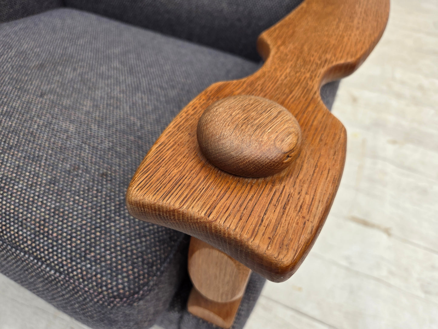 1970s, highback Danish armchair with footstool, furniture wool fabric, solid oak wood.