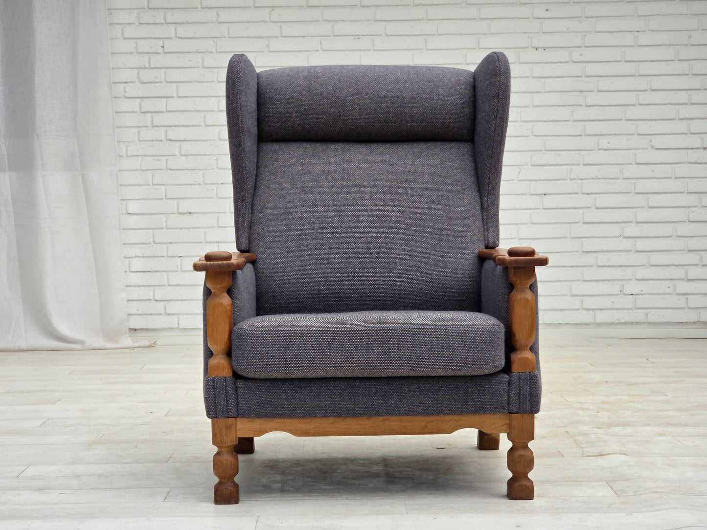 1970s, highback Danish armchair with footstool, furniture wool fabric, solid oak wood.