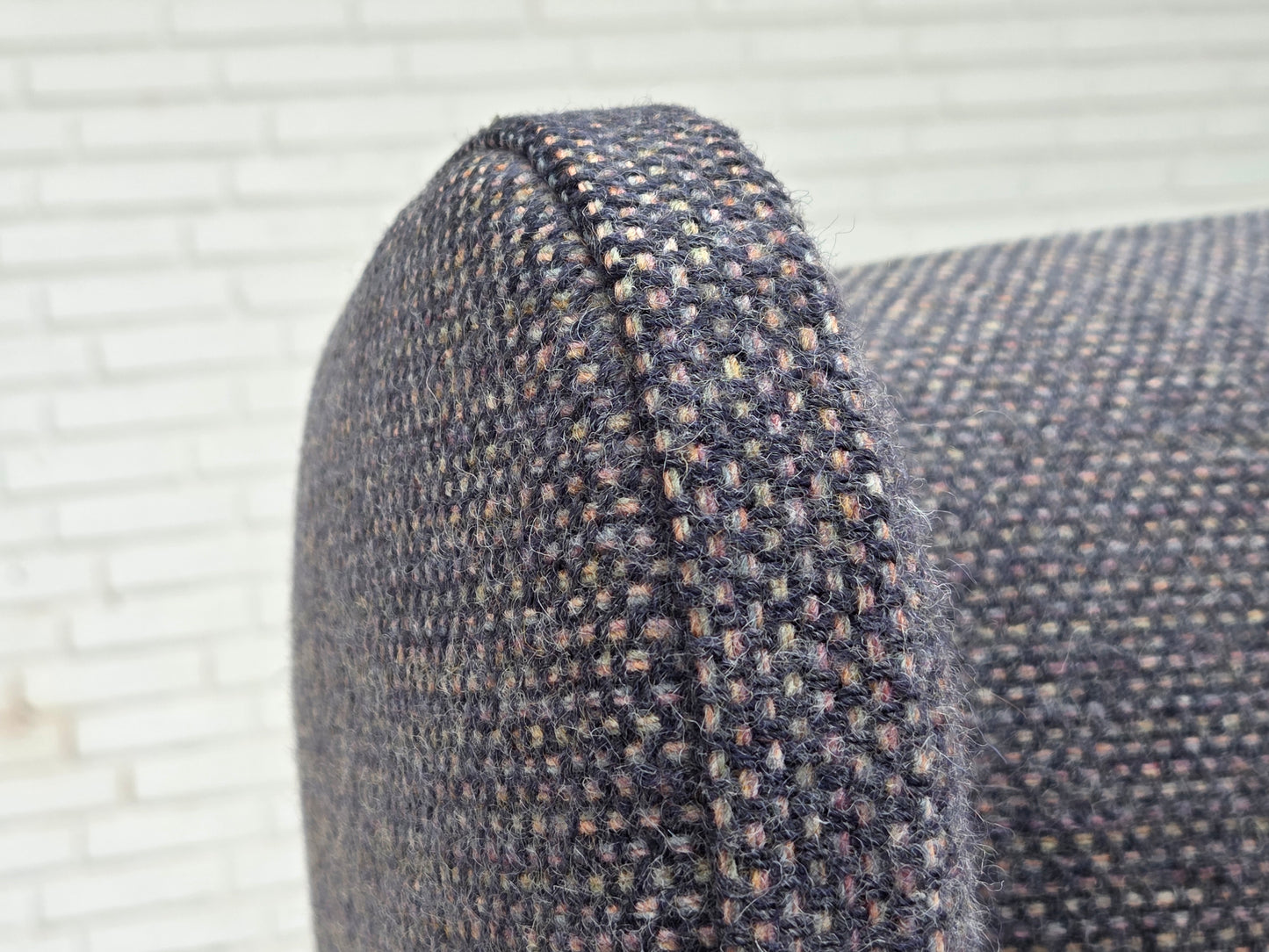 1970s, highback Danish armchair with footstool, furniture wool fabric, solid oak wood.