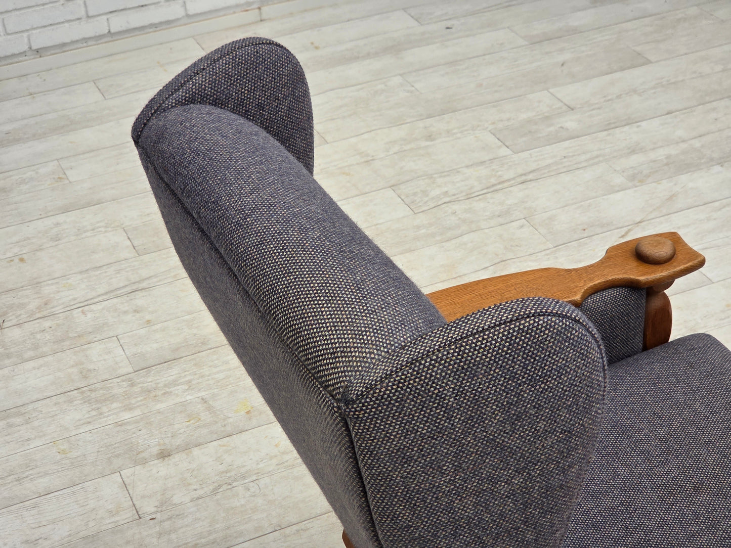 1970s, highback Danish armchair with footstool, furniture wool fabric, solid oak wood.