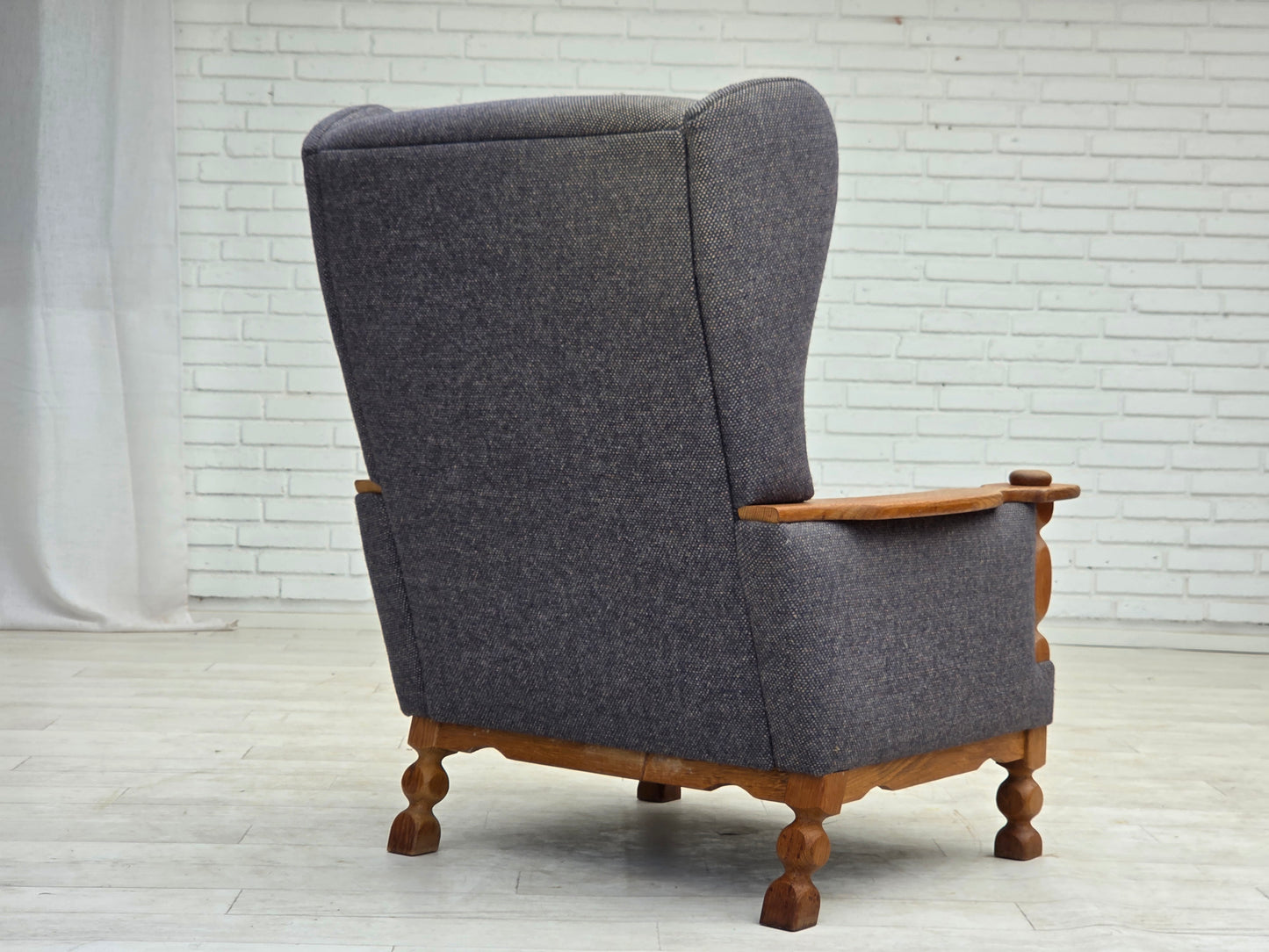 1970s, highback Danish armchair with footstool, furniture wool fabric, solid oak wood.