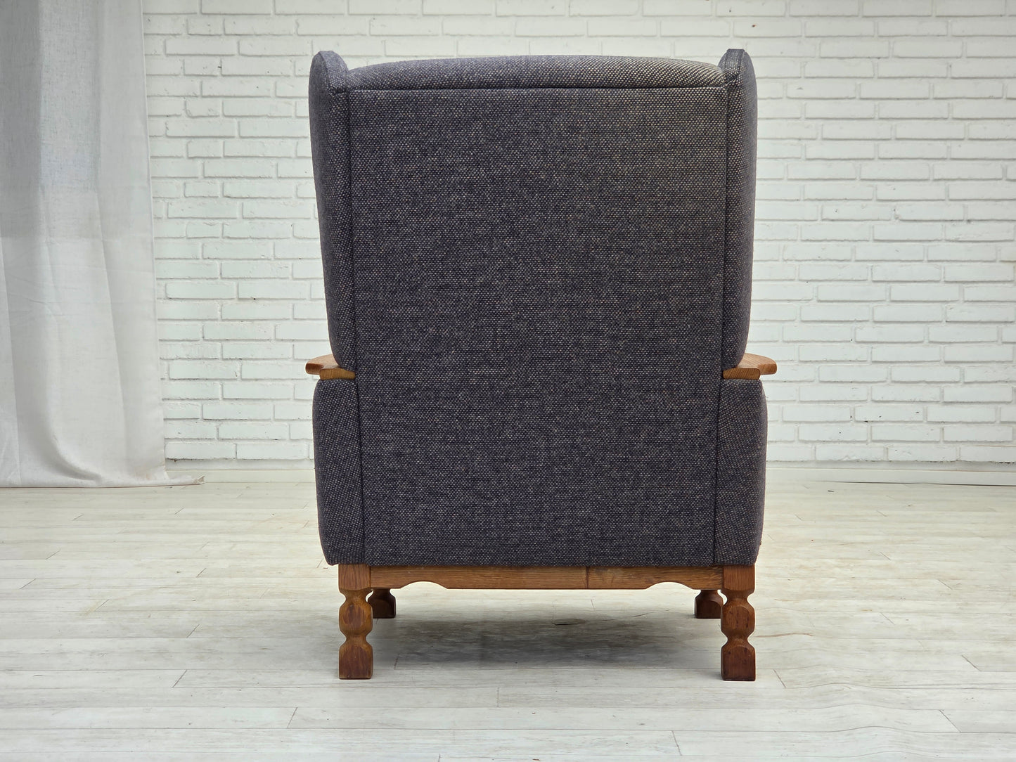 1970s, highback Danish armchair with footstool, furniture wool fabric, solid oak wood.