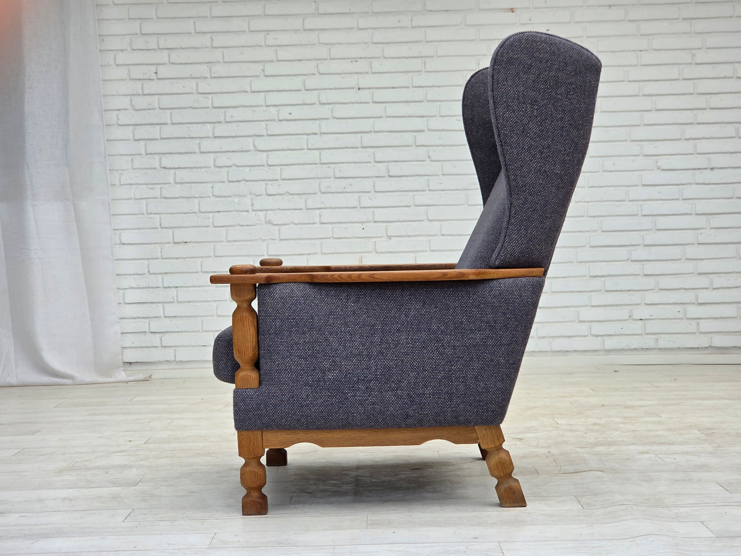 1970s, highback Danish armchair with footstool, furniture wool fabric, solid oak wood.