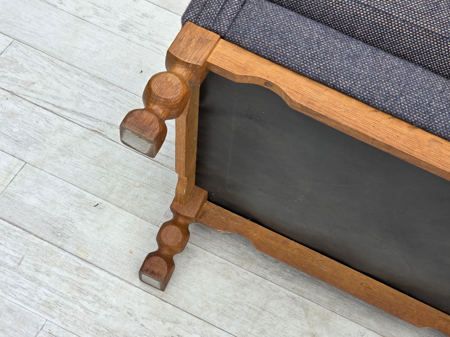 1970s, highback Danish armchair with footstool, furniture wool fabric, solid oak wood.