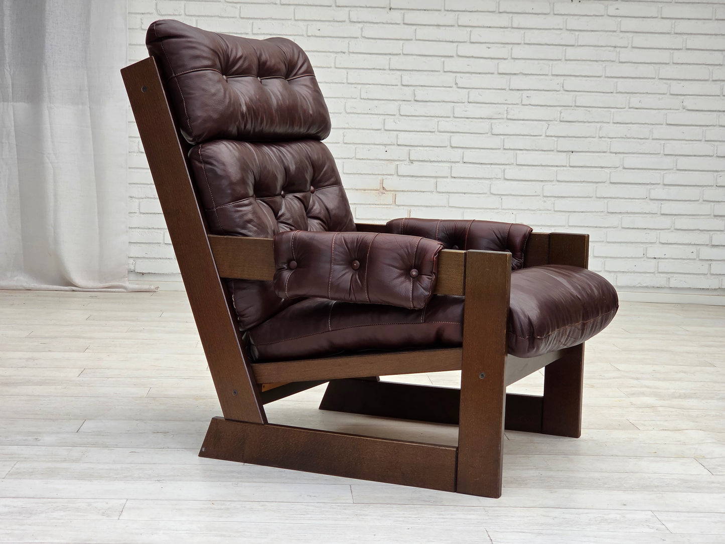 1970s, Scandinavian highback armchair, brown furniture leather, dark beech wood.