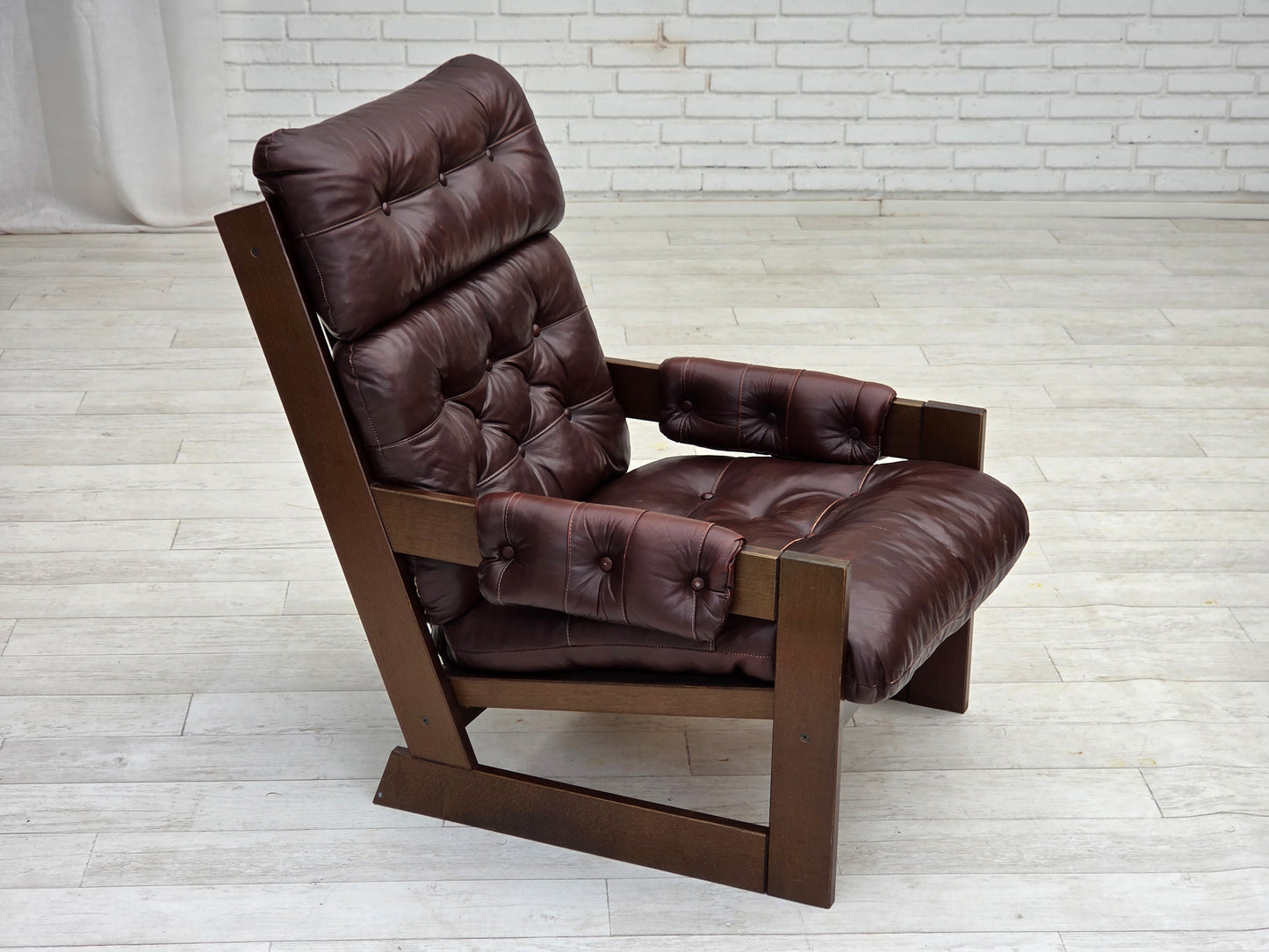 1970s, Scandinavian highback armchair, brown furniture leather, dark beech wood.