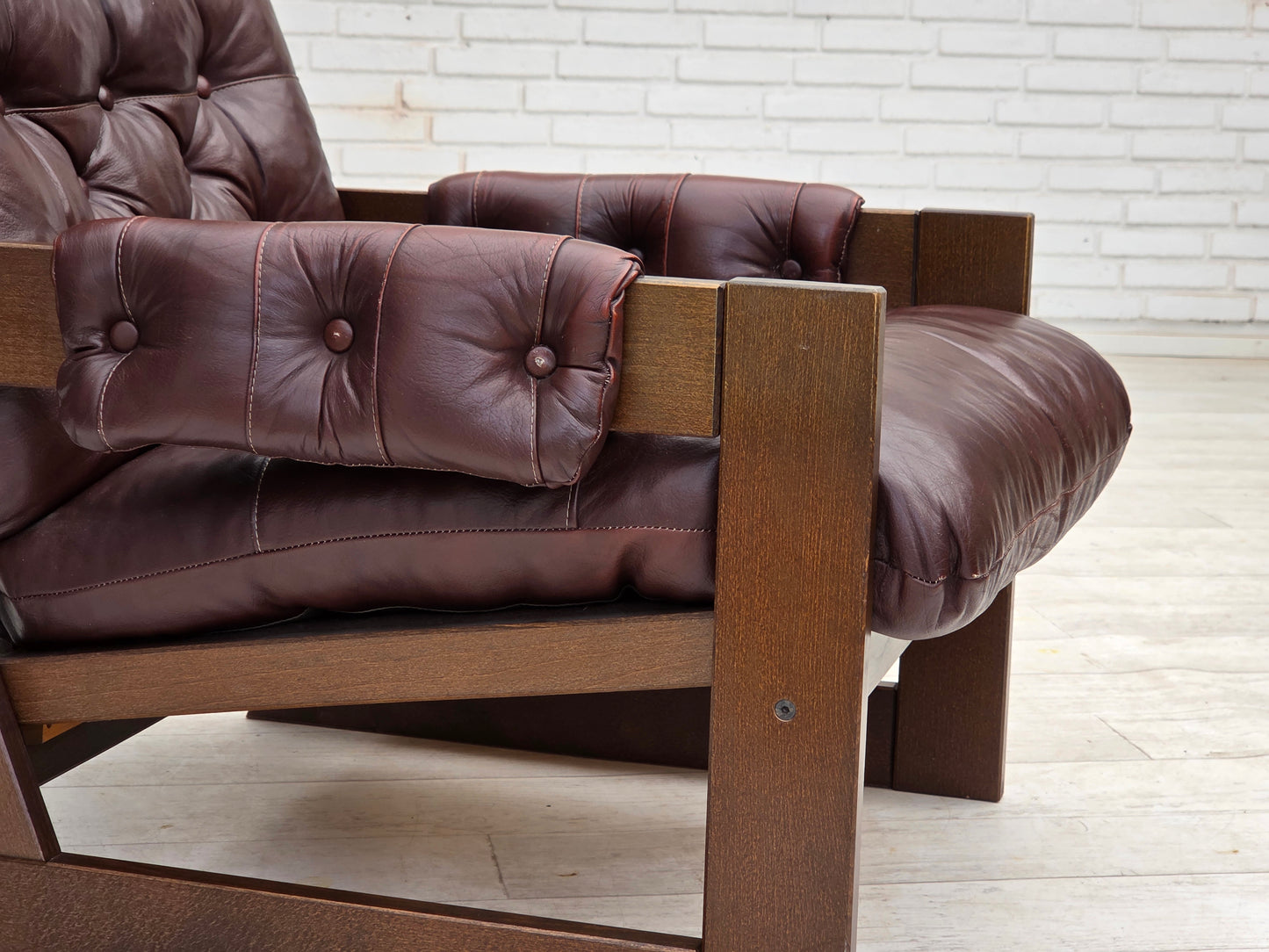 1970s, Scandinavian highback armchair, brown furniture leather, dark beech wood.