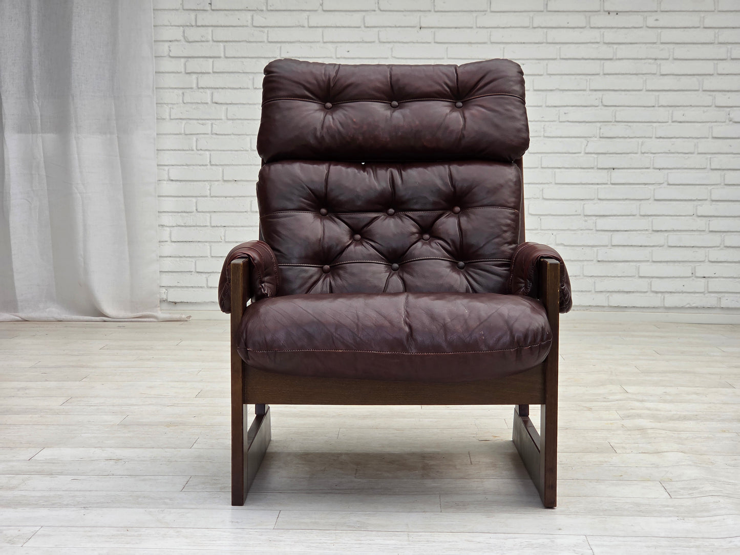 1970s, Scandinavian highback armchair, brown furniture leather, dark beech wood.