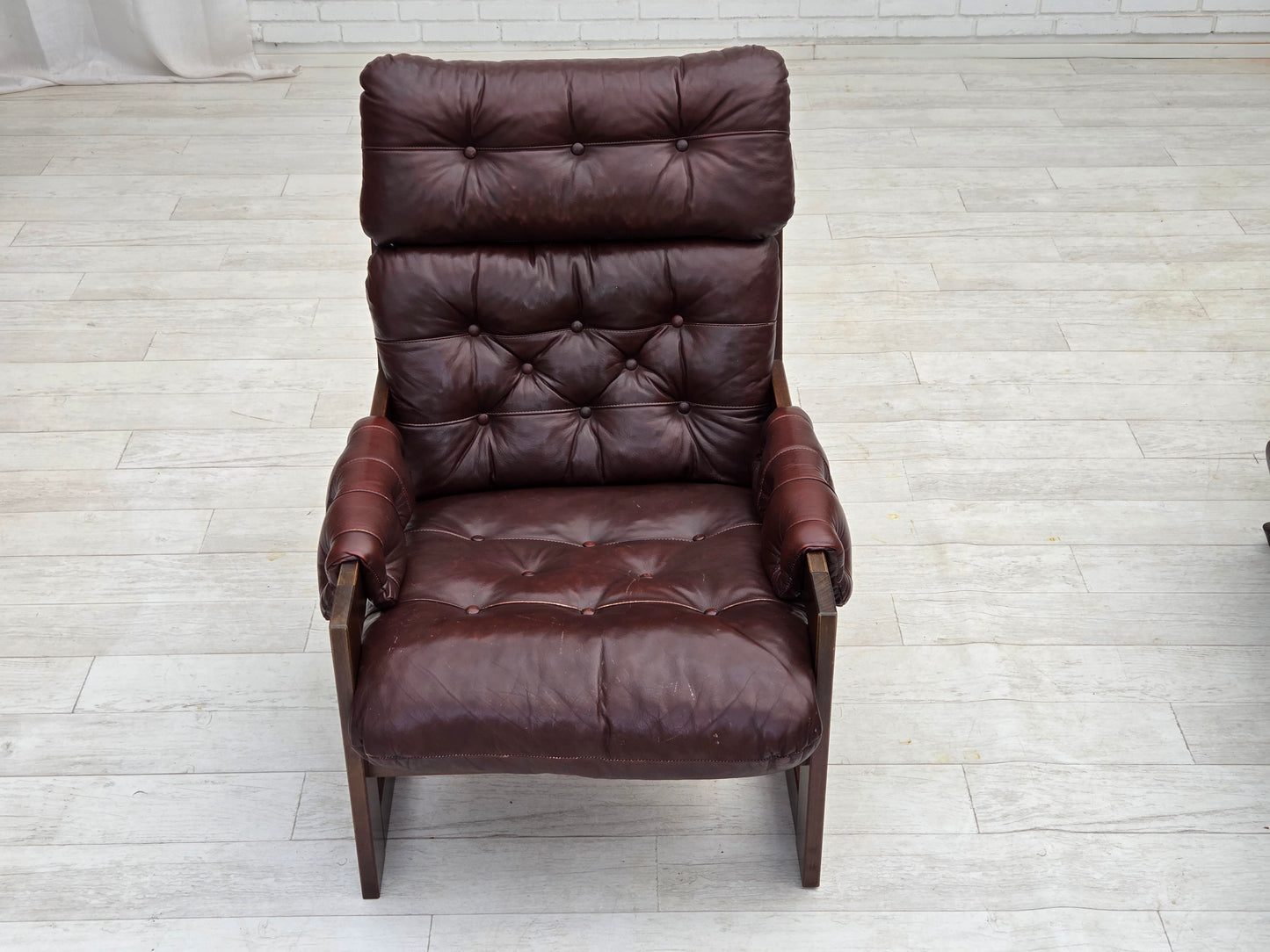 1970s, Scandinavian highback armchair, brown furniture leather, dark beech wood.