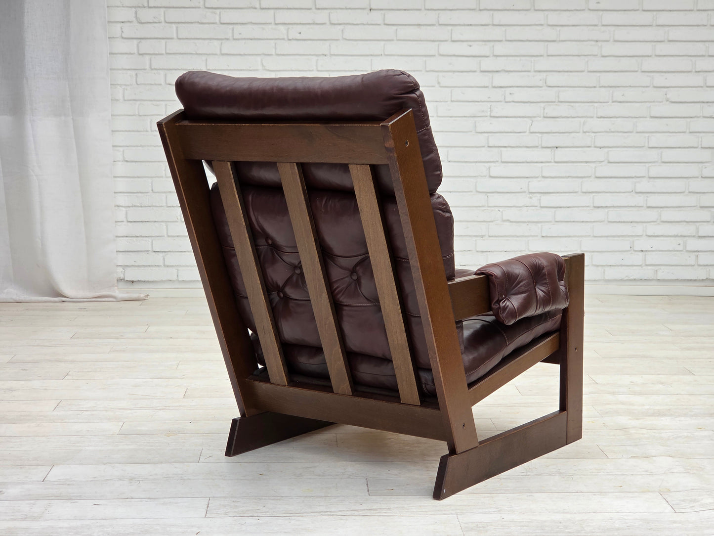 1970s, Scandinavian highback armchair, brown furniture leather, dark beech wood.