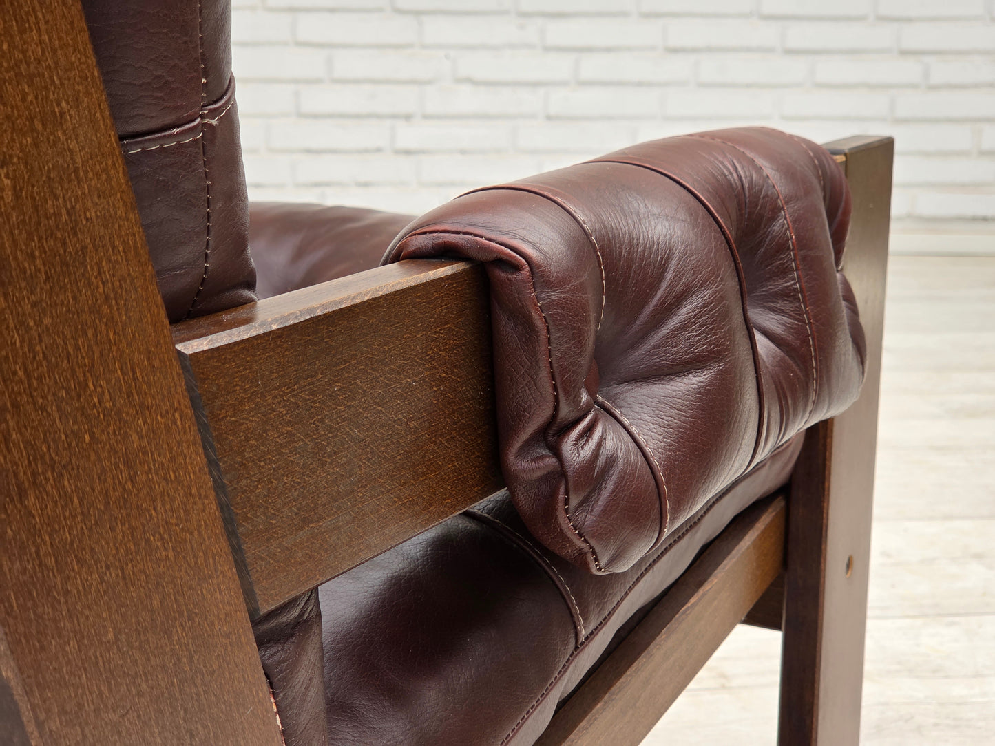 1970s, Scandinavian highback armchair, brown furniture leather, dark beech wood.