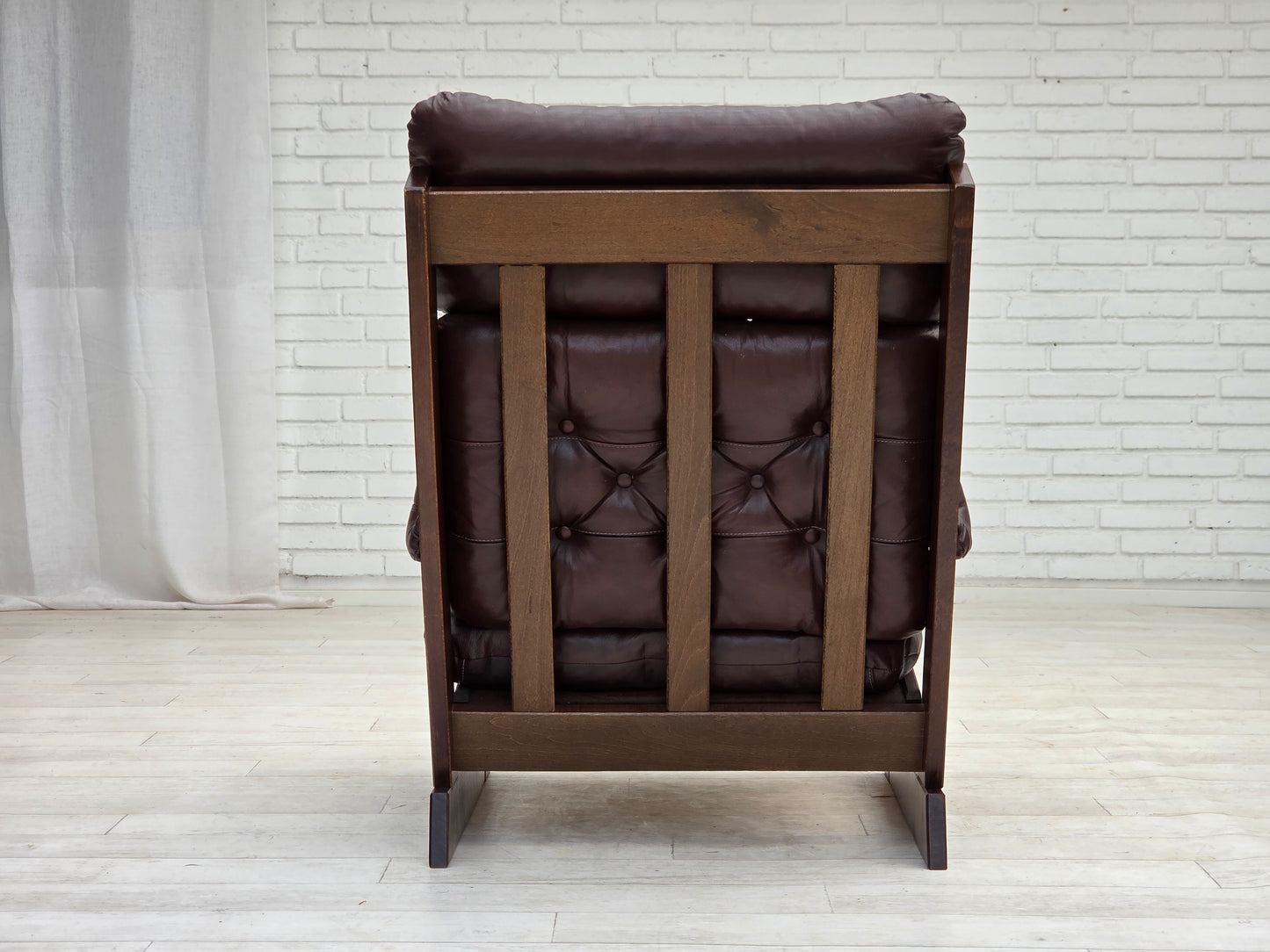 1970s, Scandinavian highback armchair, brown furniture leather, dark beech wood.