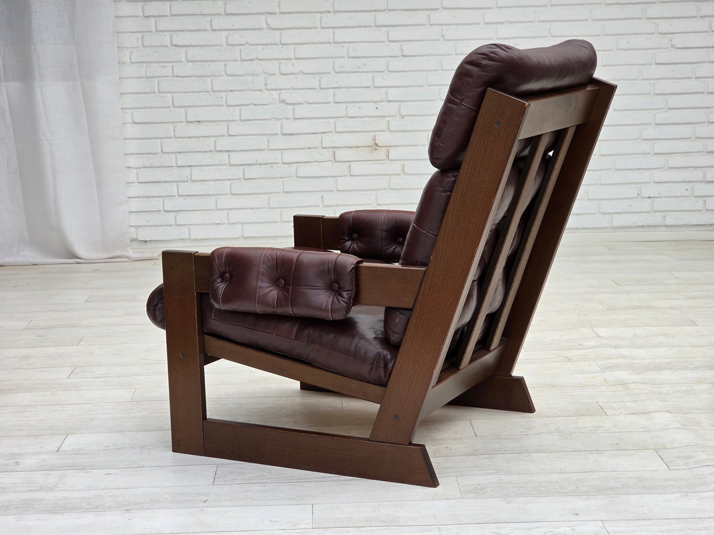 1970s, Scandinavian highback armchair, brown furniture leather, dark beech wood.