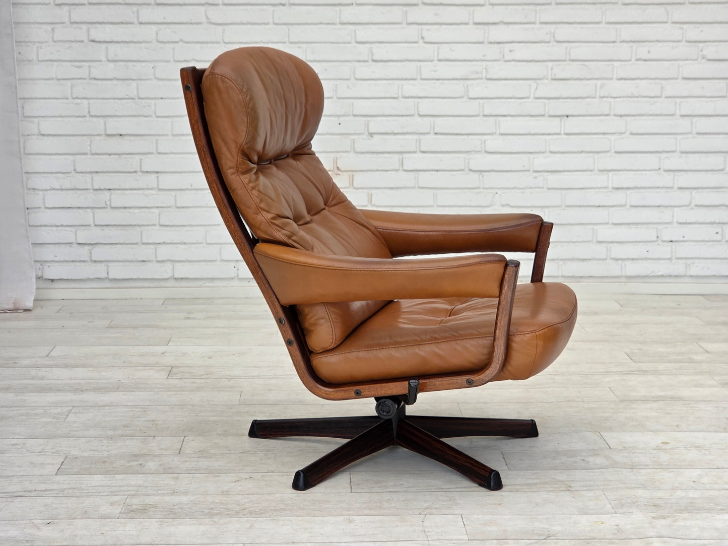 1970s, Swedish design by Gote Möbler, swivel chair with footstool, leather.