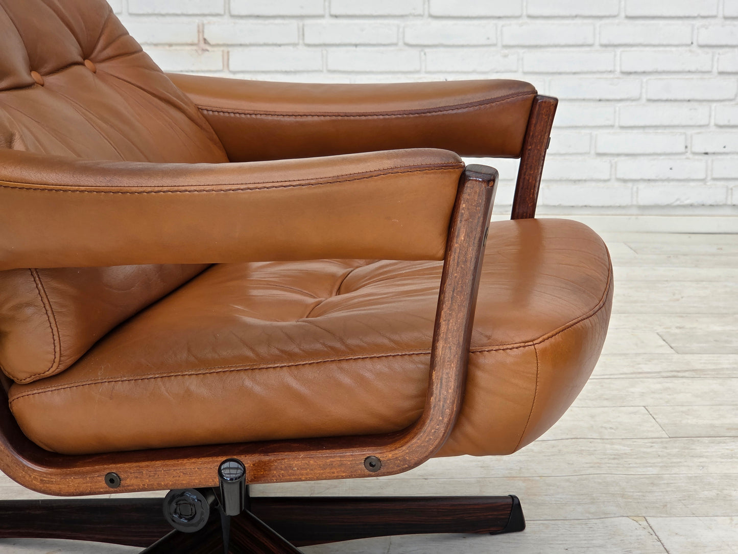 1970s, Swedish design by Gote Möbler, swivel chair with footstool, leather.