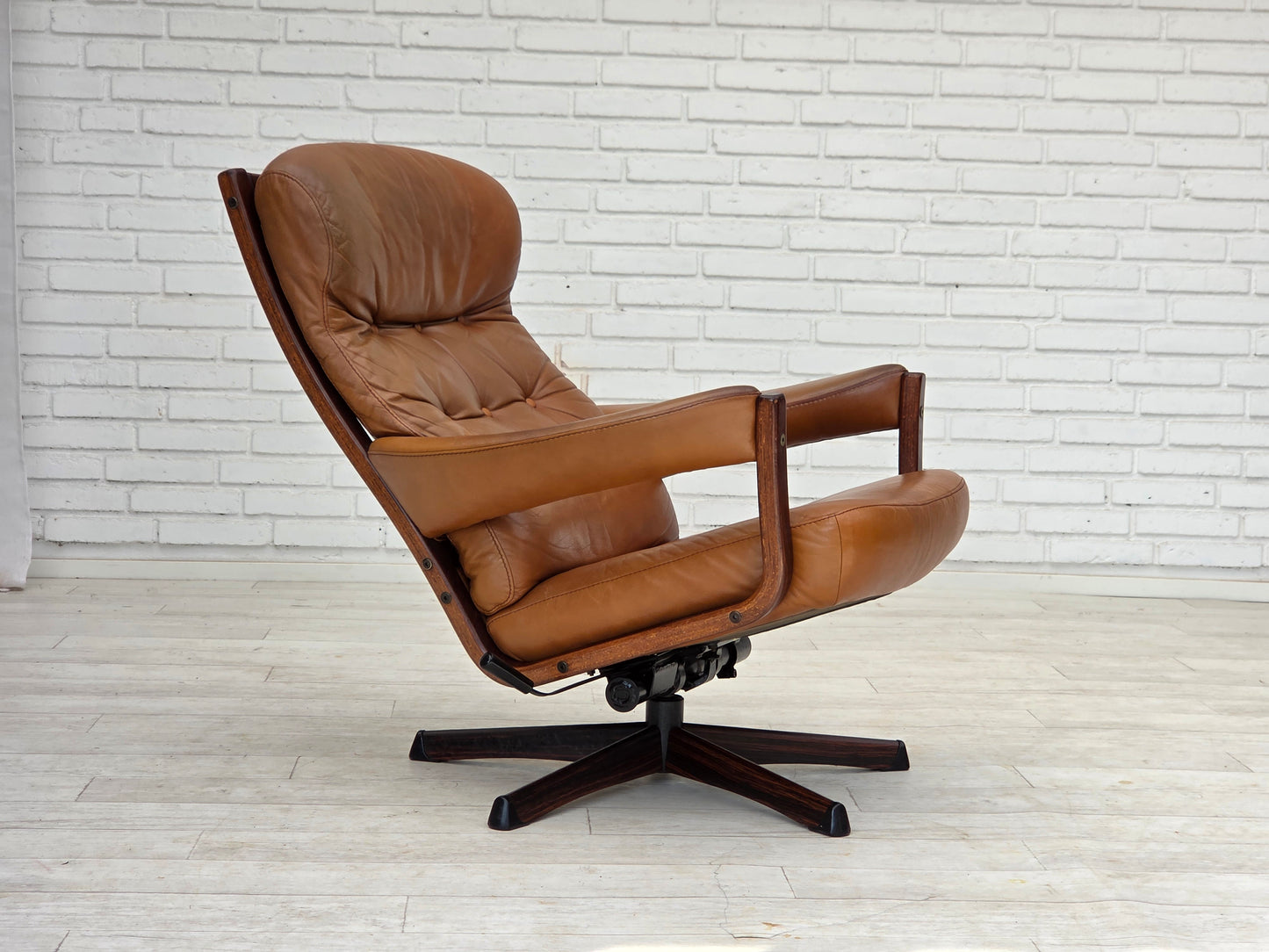 1970s, Swedish design by Gote Möbler, swivel chair with footstool, leather.