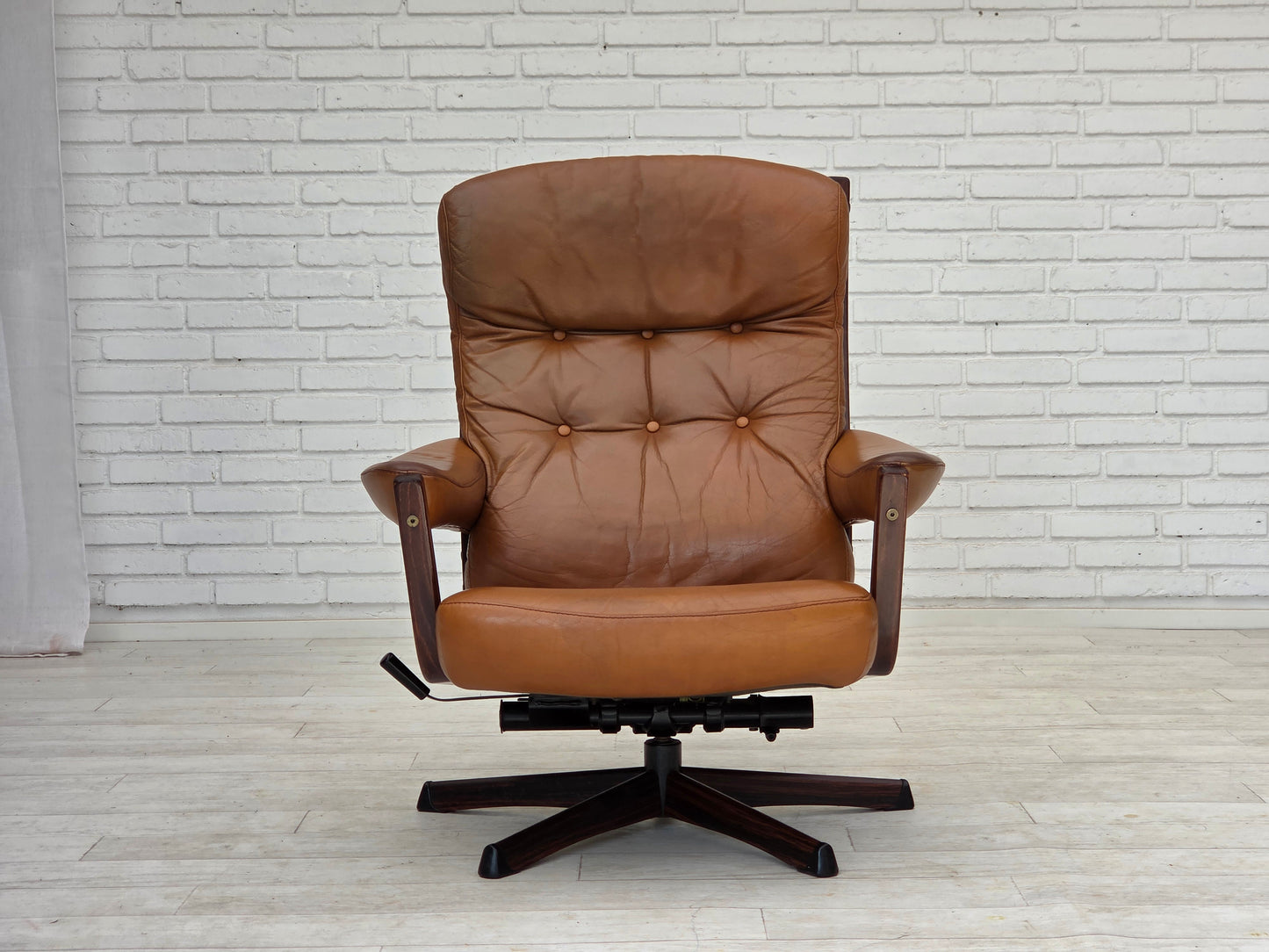 1970s, Swedish design by Gote Möbler, swivel chair with footstool, leather.